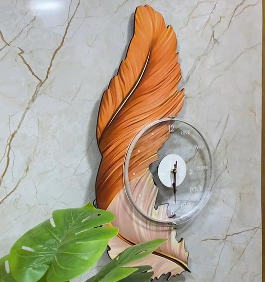 ساعة حائط ريشة